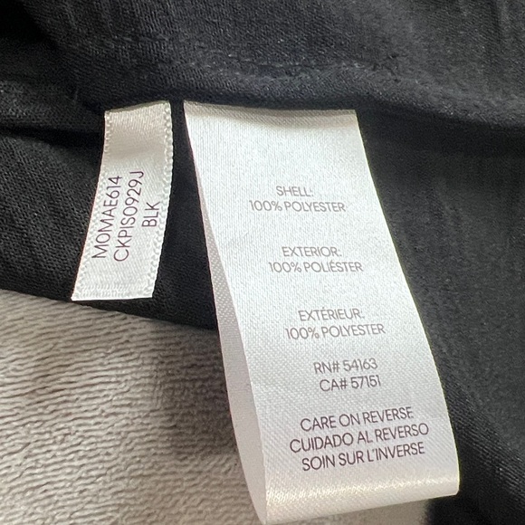 Calvin Klein Black Button Down Shirt with gold button accents. - Picture 6 of 6